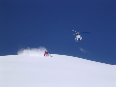 heliskiing Canada red suit solo