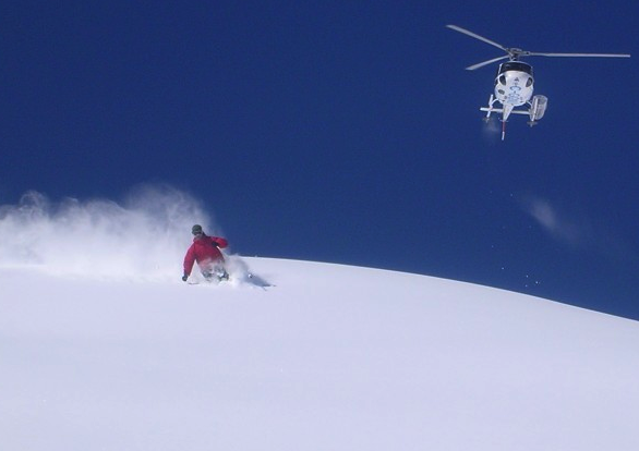 heli-skiing Canada red suit