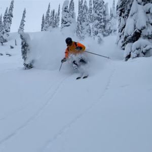 Heliski Guide Glen Kaleka doing what he does as heli ski guide